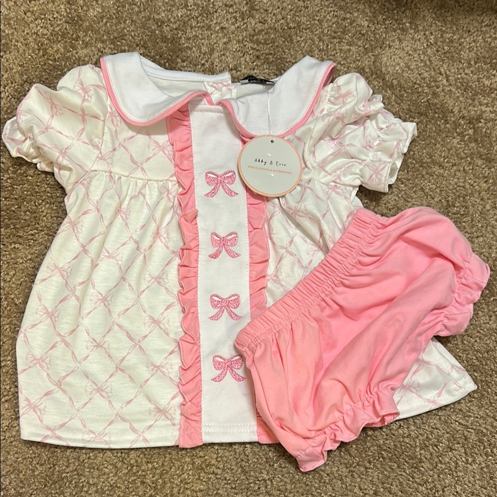 Pink and White Baby Outfit with Bows